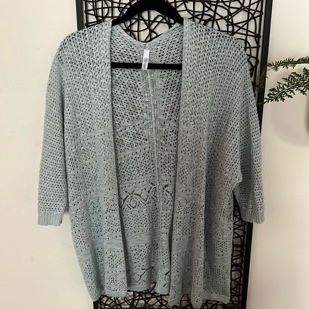 Pretty mint colored sweater with half sleeves